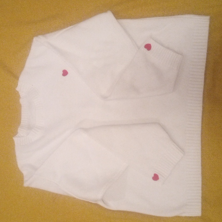 White Sweater With Red Accents